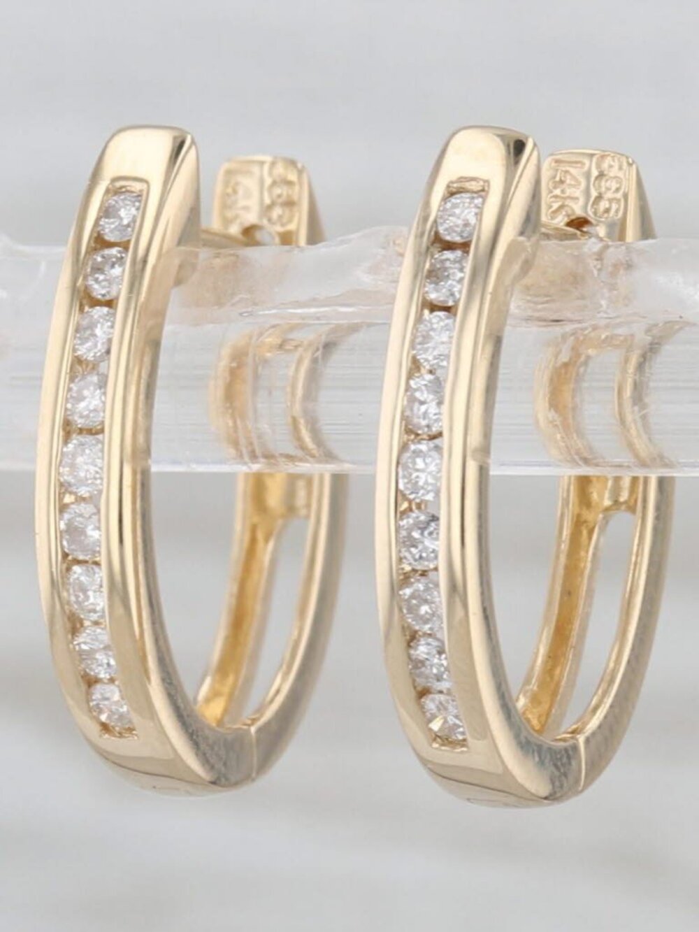 0.25ctw Diamond Journey Hinged Hoop Earrings 14k Yellow Gold Oval Hoops